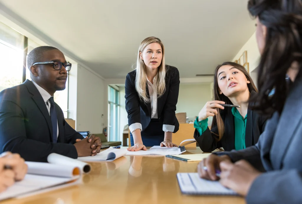 A nonprofit team discussing investment portfolios