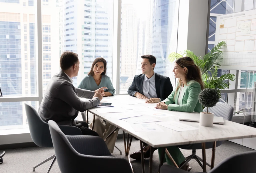 A team chatting about a portfolio